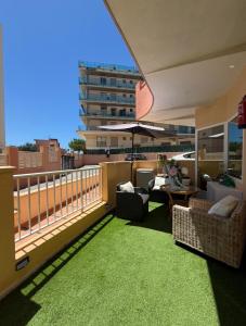 a balcony with a view of a building at Espectacular Bajo Lirio in Calpe