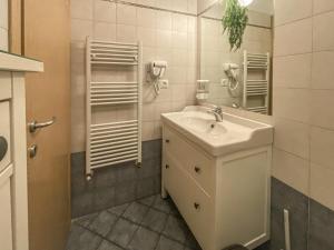 a bathroom with a sink and a mirror at Casa Le Marie in Barberino di Mugello +51 photos
