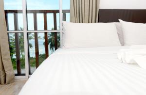 Postel nebo postele na pokoji v ubytování Express Inn at Hulhumale