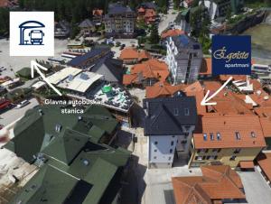 an aerial view of a city with roofs at Egoiste Guesthouse Zlatibor Center in Zlatibor