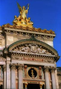 a building with a statue on top of it at Hotel Riviera OPERA Cadet in Paris +33 photos