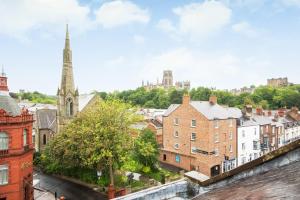 a view of a city with a church at Fifty Two Old Elvet in Durham