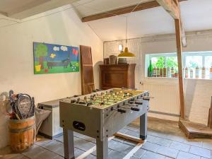 a room with a foosball game on a table at Platschorre in Oudelande