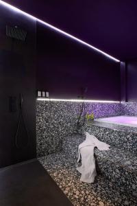 a bathroom with a bath tub and a sink at Your very unique private spa in Berlin Kreuzberg in Berlin