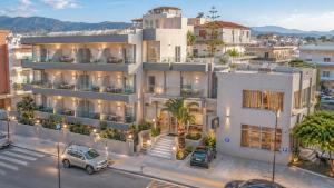 an aerial view of a white apartment building at Falassarna Hotel in Chania