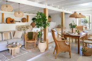 a living room with a couch and a table at Eftihia in Katouna