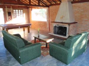 A seating area at Pousada São Luiz - Monte Verde