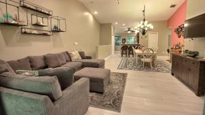 a living room with a couch and a dining room at 808 Mariners Club in Key Largo