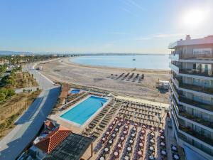 an aerial view of a beach with a building at Golden Donaire Beach 4 Sup in La Pineda