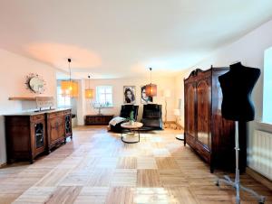 a living room with a mannequin in the middle of the room at II Bramasole - Sophia L in Spreewitz