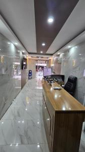 an office with a desk with a laptop on it at Sever Hotel in Antalya