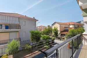 a view of a balcony of a building at Isonzo Holiday Home - 2 bedrooms in Loano