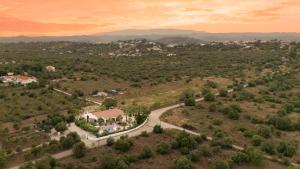 an aerial view of a road leading to a house at Quinta das Amendoeiras B&B in Nora