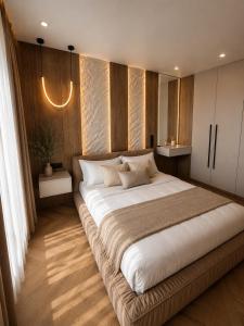 a large bed in a bedroom with wooden walls at Great Apart - Вид на Дніпро - 6 поверх - укриття на території ЖК in Kyiv