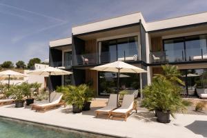 an image of a villa with a swimming pool at Luxury Experience Suites in Toledo