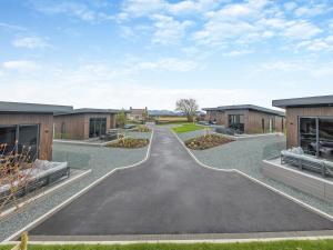 a driveway leading to a building at Lligwy Lodge 3 - Uk42793 in Llangefni