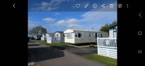 a row of mobile homes on a street at Steeple Bay E68 in Steeple