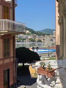 a balcony of a building with a view of the water at Villa Cristina in Rapallo