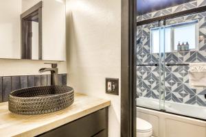 a bathroom with a sink and a toilet at Orion Ridge Retreat in Stateline +5 photos