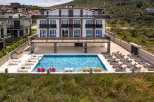 an aerial view of a house with a swimming pool at Asil Luxury Boutique in Burhaniye