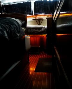a view of the back of a boat with a bed at Eco Yacht Charters in Almere