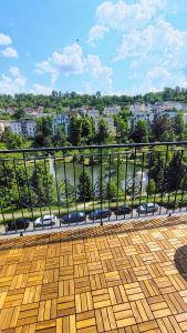 a view of a city from a balcony at Penthouse am Kurparkweiher in Bad Schwalbach