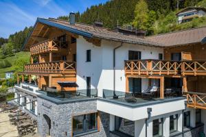 an aerial view of a house with a balcony at Sonnenseite Filzmoos in Filzmoos