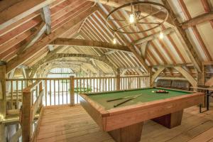 a room with a pool table in a building at 5 Bed in Tiverton oc-48151 in Cadeleigh