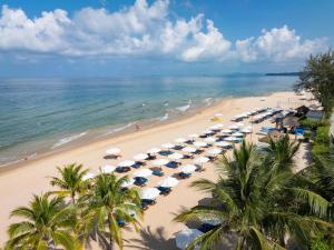 an overhead view of a beach with umbrellas and the ocean at Radisson Blu Resort Phu Quoc in Phú Quốc