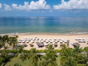 an aerial view of a beach with umbrellas and the ocean at Radisson Blu Resort Phu Quoc in Phú Quốc