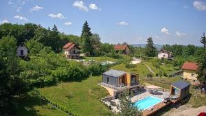 an aerial view of a house with a swimming pool at Šumska Duša in Banja Luka