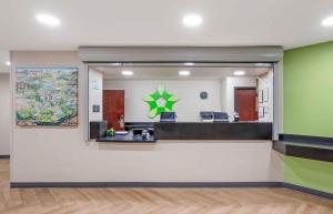 a waiting room with a star on the wall at Extended Stay America Suites - St Petersburg - Clearwater - Executive Dr in Clearwater