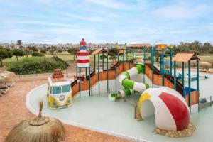 a playground with a slide and a lighthouse at ALEGRIA Cabo De Gata Aquafun in Retamar