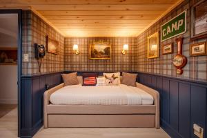 a bedroom with a large bed in a room at Paddle Point in West Milford