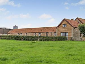 a house with a green field in front of it at 2 Bed in Bristol oc-72837 in Chew Magna