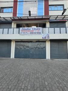 a building with a sign on the side of it at ML STUDIO with Rooftop, Free wifi, Free Parking in Nakuru
