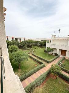 an aerial view of a garden in a building at Cozy Seaside Villa in Bir Jedíd Saint-Hubert