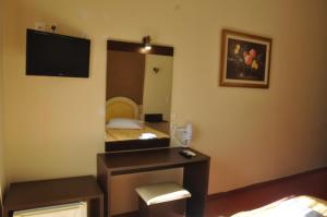 TV o dispositivi per l'intrattenimento presso Hotel Drosia