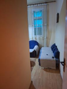 a room with a bed and a window in it at Anita in Danilovgrad