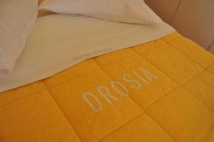 Letto o letti in una camera di Hotel Drosia