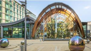 a large glass building with a large window at Stylish City Centre Studio, Sleeps 2 in Sheffield