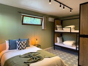 a bedroom with two bunk beds and a window at Villa Ada in Faro +106 photos