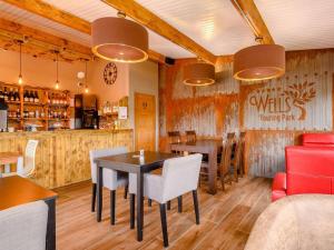 a restaurant with tables and chairs and a bar at 1 Bed in Wells oc-88969 in Wells +8 photos