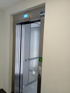 an elevator in a building with its door open at Living Burgos in Burgos