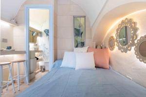 Llit o llits en una habitació de Angolo Laggetto