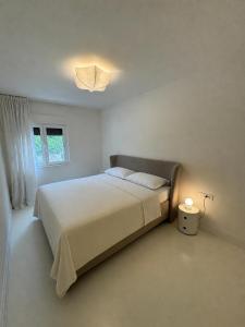 Apartment Oasis tesisinde bir odada yatak veya yataklar
