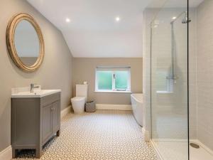 a bathroom with a sink toilet and a mirror at 2 Bed in Hope Valley oc-88979 in Sheffield +11 photos