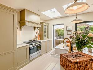 a kitchen with a sink and a stove at 2 Bed in Helmsley oc-92946 in Helmsley