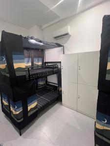 a room with a bunk bed in a room at Hanoi Backpacker Home in Hanoi +18 photos