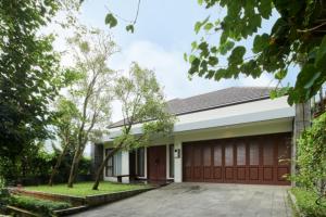 a rendering of a house with a garage at Hikari Hill View Villa 7 Bedrooms With a Private Swimming Pool and a Billiard Table in Bandung